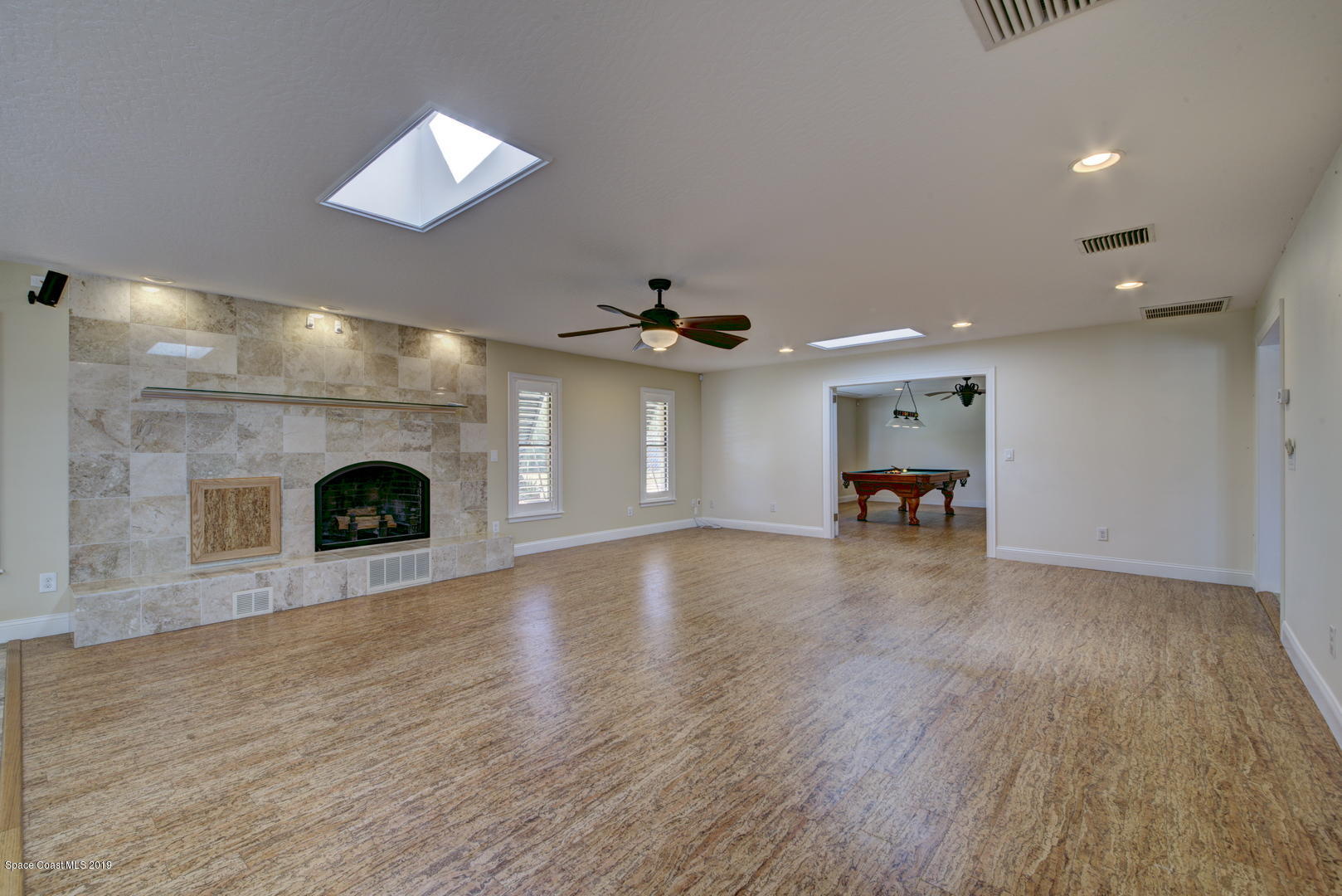5725 Lake Washington Road Melbourne, FL 32934 - Photo 39 of 72 Living Room with Fireplace