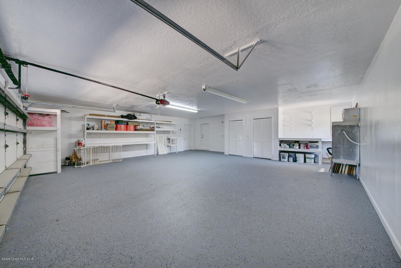 5725 Lake Washington Road Melbourne, FL 32934 - Photo 56 of 72 Two Car Garage with Storage