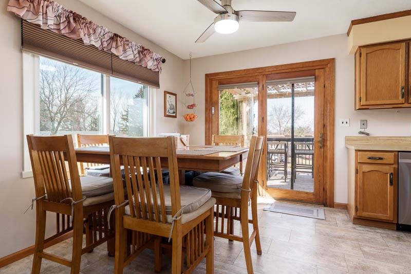 5280 Sunbird Drive Loves Park, IL 61111 - Photo 12 of 42 a view of a dining room with furniture window and outside view