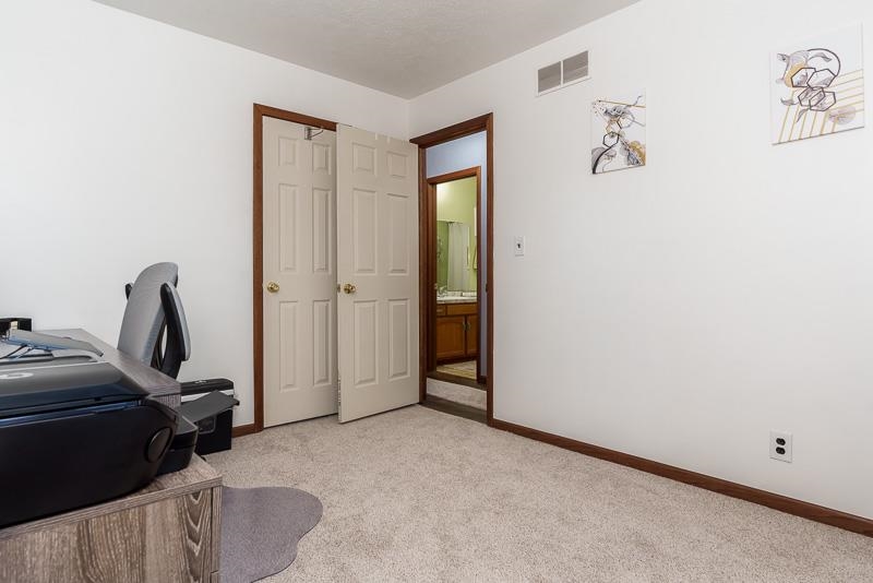 5280 Sunbird Drive Loves Park, IL 61111 - Photo 22 of 42 a view of a room with gym equipment