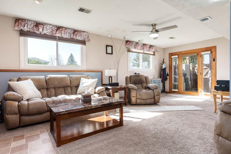 5280 Sunbird Drive Loves Park, IL 61111 - Photo 24 of 42 a living room with furniture and a large window