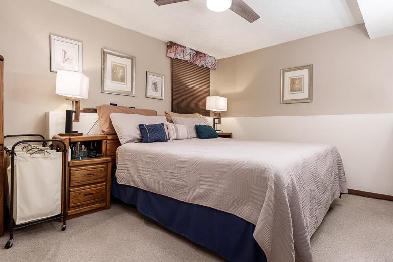 5280 Sunbird Drive Loves Park, IL 61111 - Photo 30 of 42 a bed room with a bed and a night stand