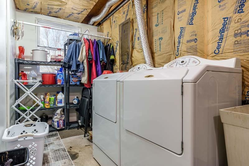 5280 Sunbird Drive Loves Park, IL 61111 - Photo 33 of 42 a utility room with dryer and washer