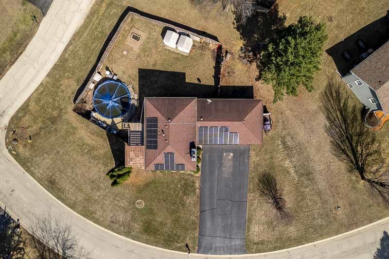 5280 Sunbird Drive Loves Park, IL 61111 - Photo 35 of 42 a view of a house with a small yard