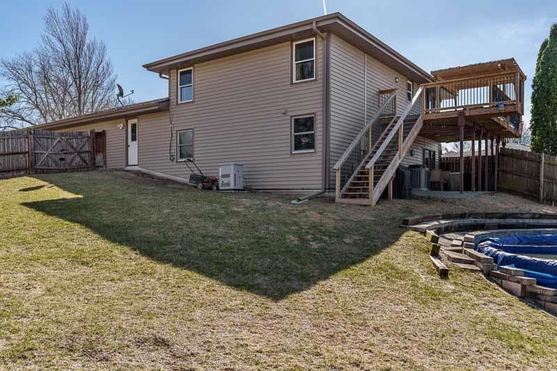 5280 Sunbird Drive Loves Park, IL 61111 - Photo 40 of 42 a view of a house with a yard