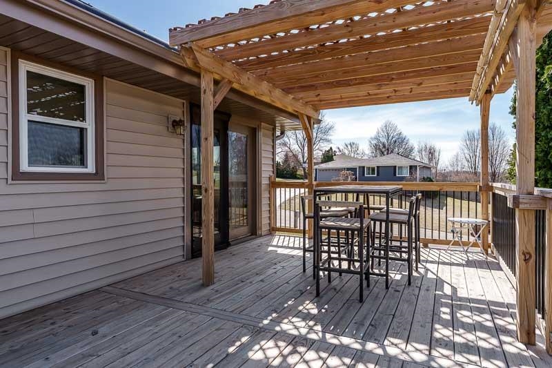 5280 Sunbird Drive Loves Park, IL 61111 - Photo 41 of 42 a view of a chairs on the deck