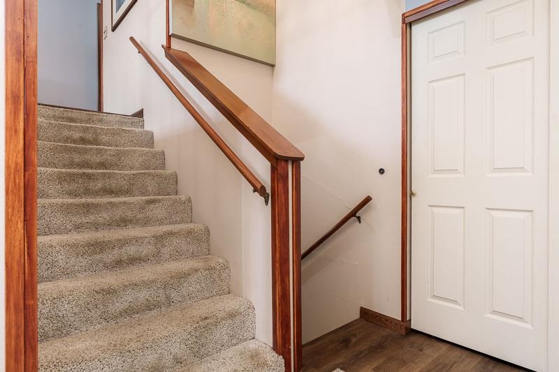 5280 Sunbird Drive Loves Park, IL 61111 - Photo 5 of 42 a view of staircase with white walls and white door