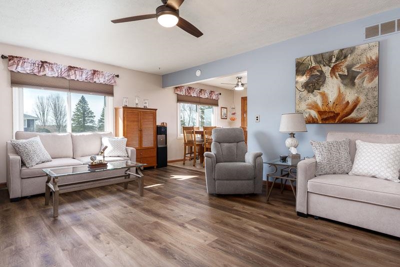 5280 Sunbird Drive Loves Park, IL 61111 - Photo 8 of 42 a living room with furniture and a large window