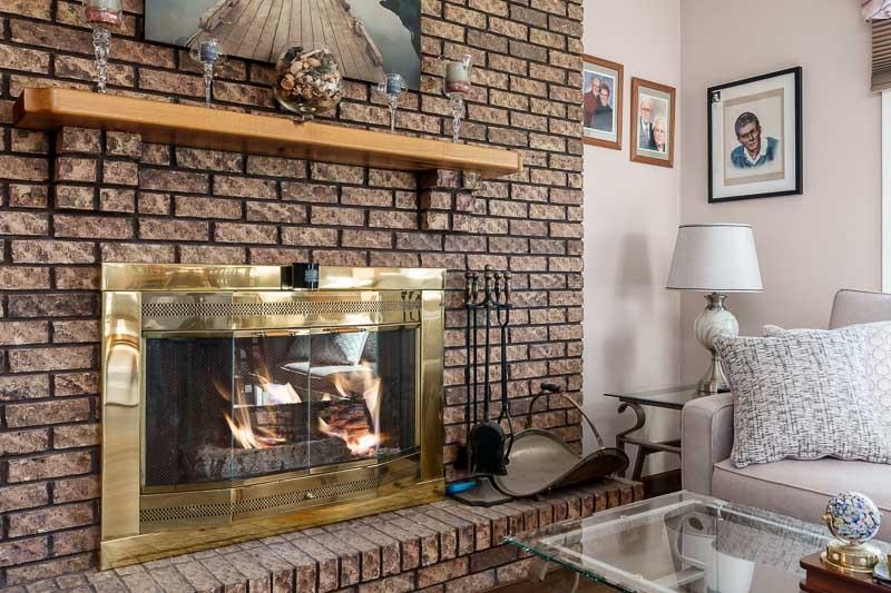 5280 Sunbird Drive Loves Park, IL 61111 - Photo 9 of 42 a room with furniture and a fireplace