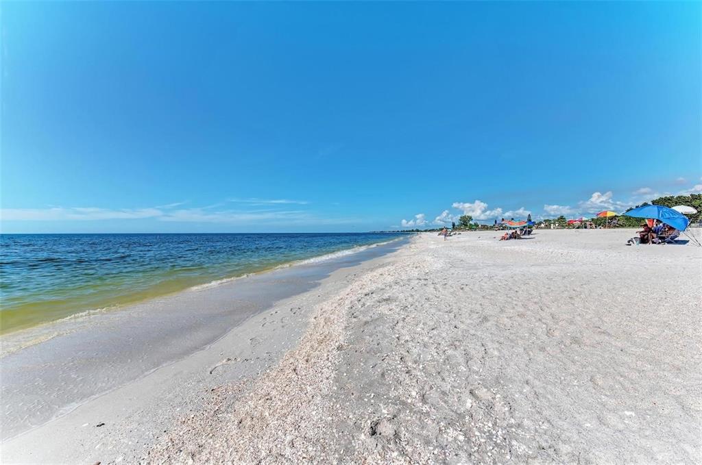 227 Lychee Road Nokomis, FL 34275 - Photo 27 of 36 a view of beach and ocean view