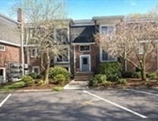 80 Walnut Street, Unit 402 Canton, MA 02021 - Photo 6 of 6 a front view of a house with garden