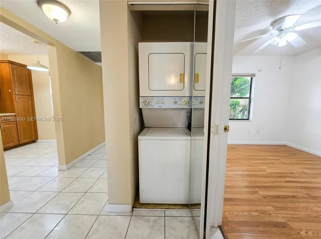 a view of hallway with washer and dryer