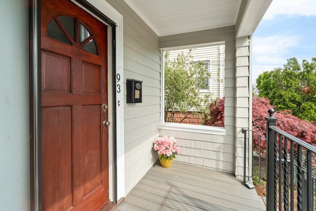 93 Puritan Road, Unit 93 Somerville, MA 02145 - Photo 1 of 20 a view of a entryway door front of house