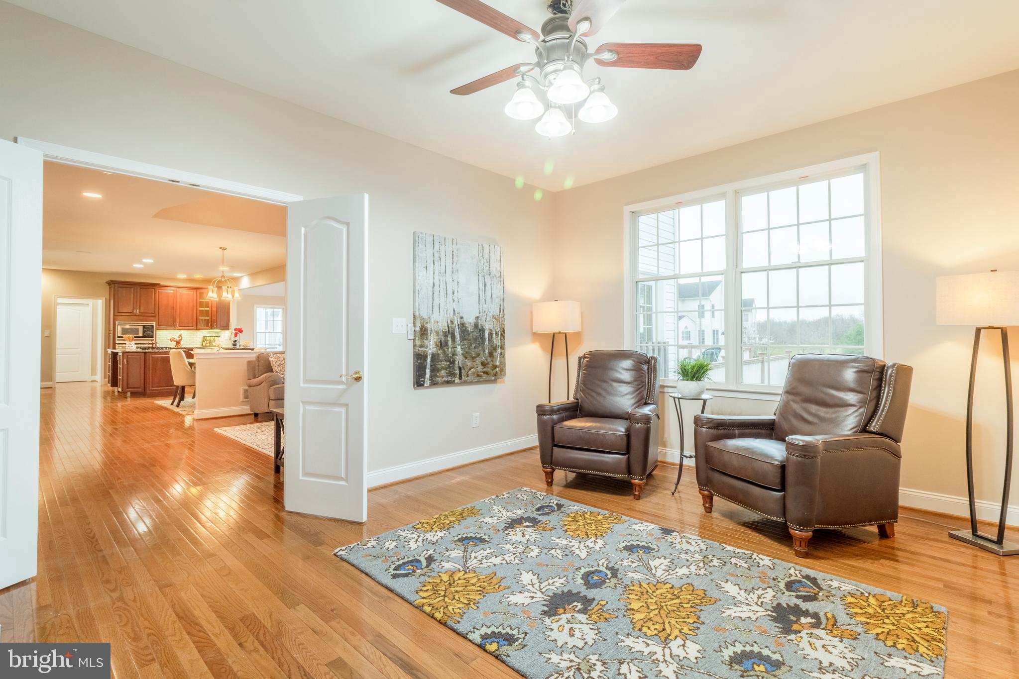 415 Nattull Drive Bear, DE 19701 - Photo 22 of 46 a living room with furniture and a wooden floor