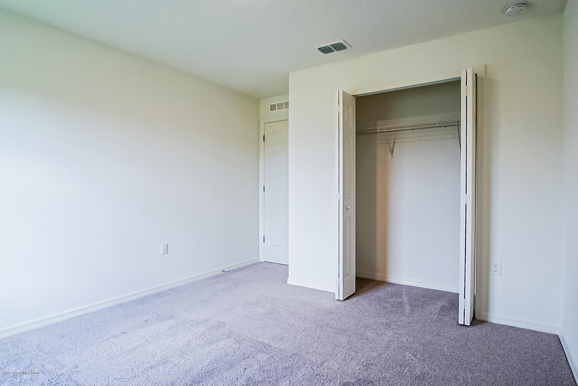 499 Scenic Road Palm Bay, FL 32908 - Photo 17 of 22 a view of an empty room
