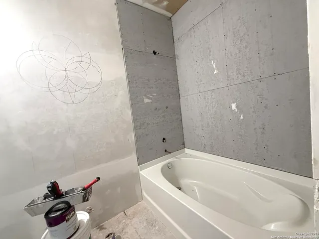 a bathroom with a bathtub