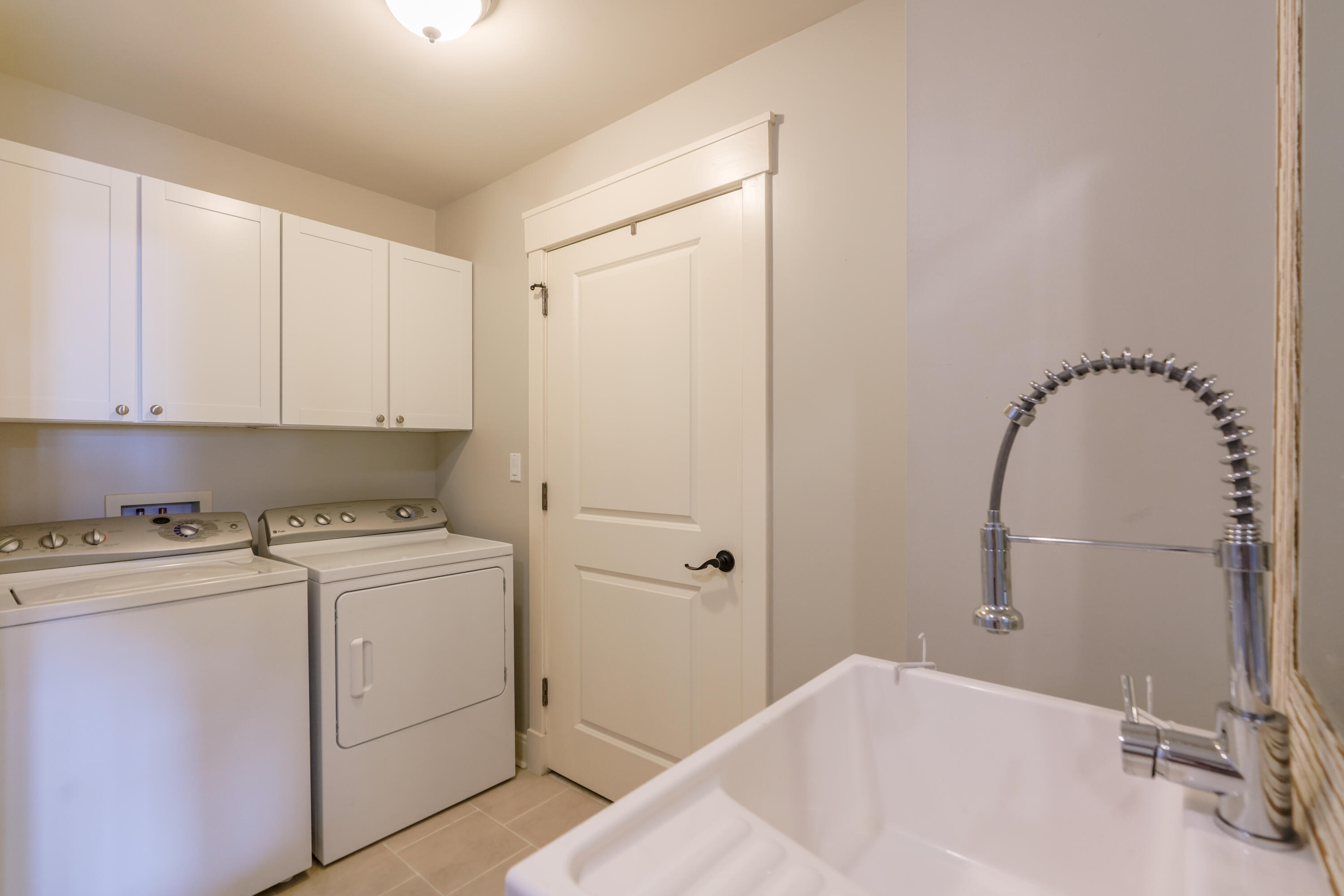 1101 Prospect Promenade, Unit 101 Panama City Beach, FL 32413 - Photo 13 of 49 a bathroom with a sink and a mirror