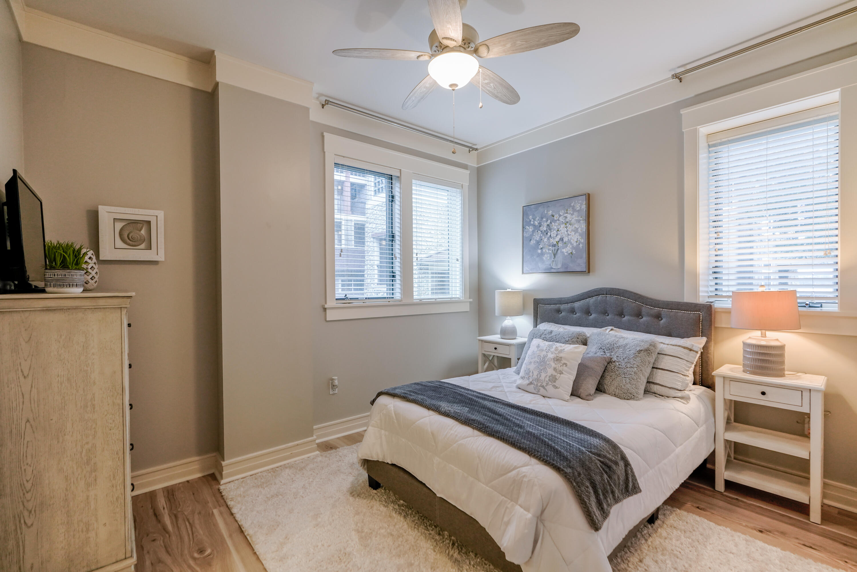 1101 Prospect Promenade, Unit 101 Panama City Beach, FL 32413 - Photo 19 of 49 a bedroom with a bed and a window
