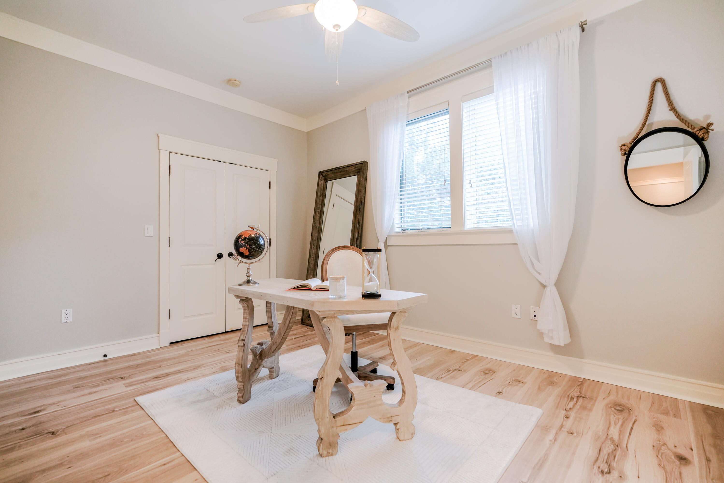 1101 Prospect Promenade, Unit 101 Panama City Beach, FL 32413 - Photo 21 of 49 a workspace with furniture and window