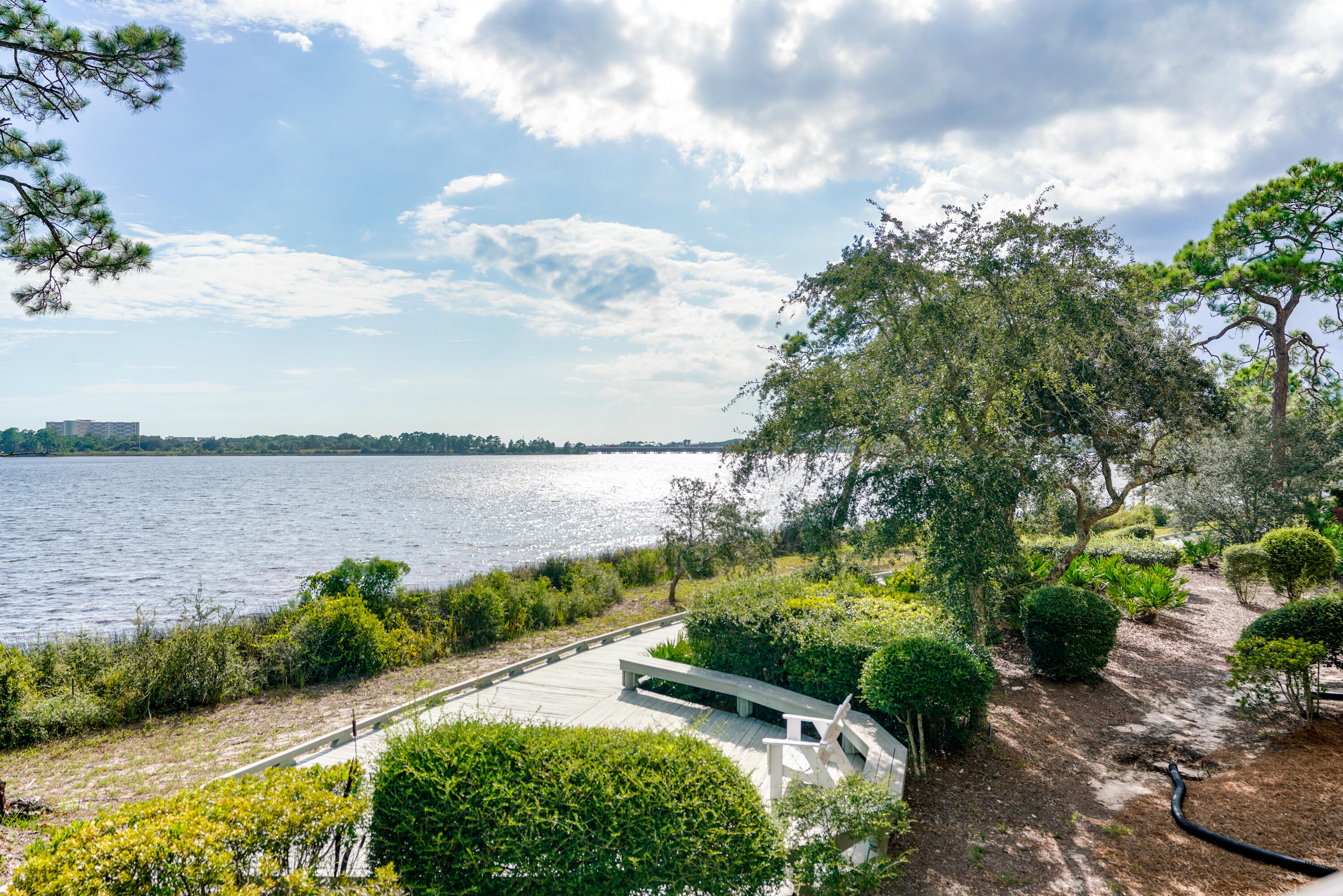 1101 Prospect Promenade, Unit 101 Panama City Beach, FL 32413 - Photo 28 of 49 a view of a lake with outdoor space