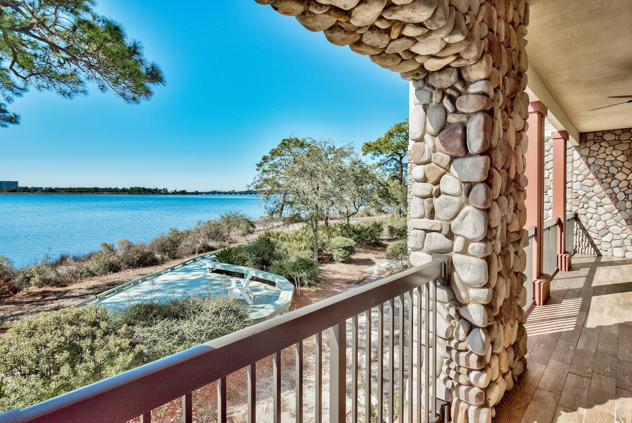 1101 Prospect Promenade, Unit 101 Panama City Beach, FL 32413 - Photo 49 of 49 a view of a lake from a balcony