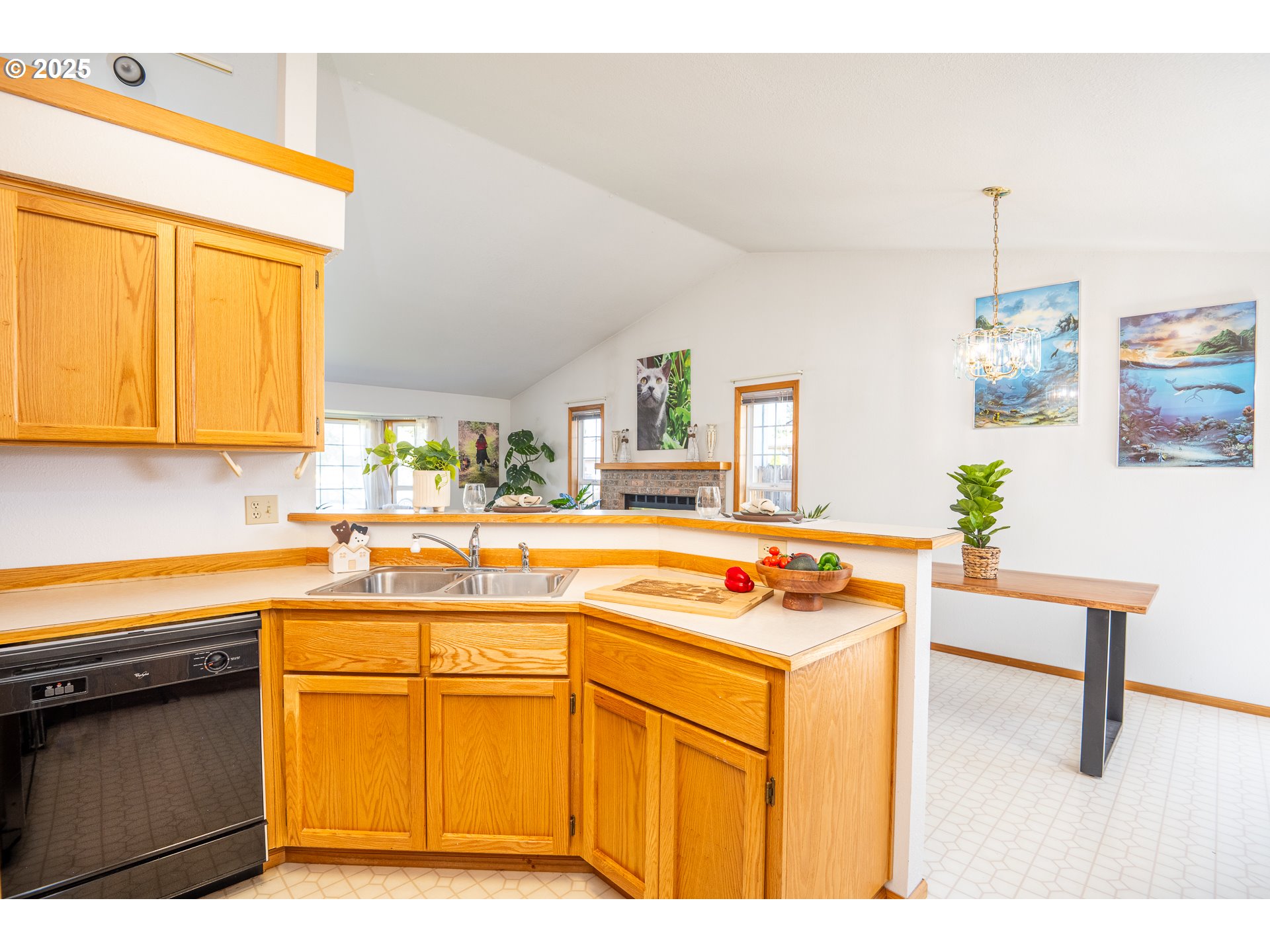 5669 D Street Springfield, OR 97478 - Photo 11 of 30 a kitchen with stainless steel appliances granite countertop a sink and cabinets