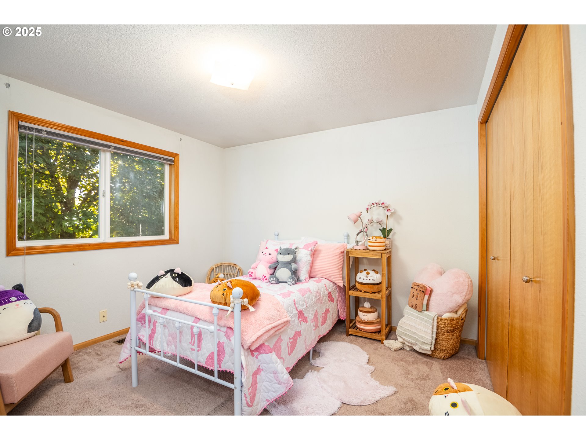 5669 D Street Springfield, OR 97478 - Photo 17 of 30 a bedroom with a bed and a window