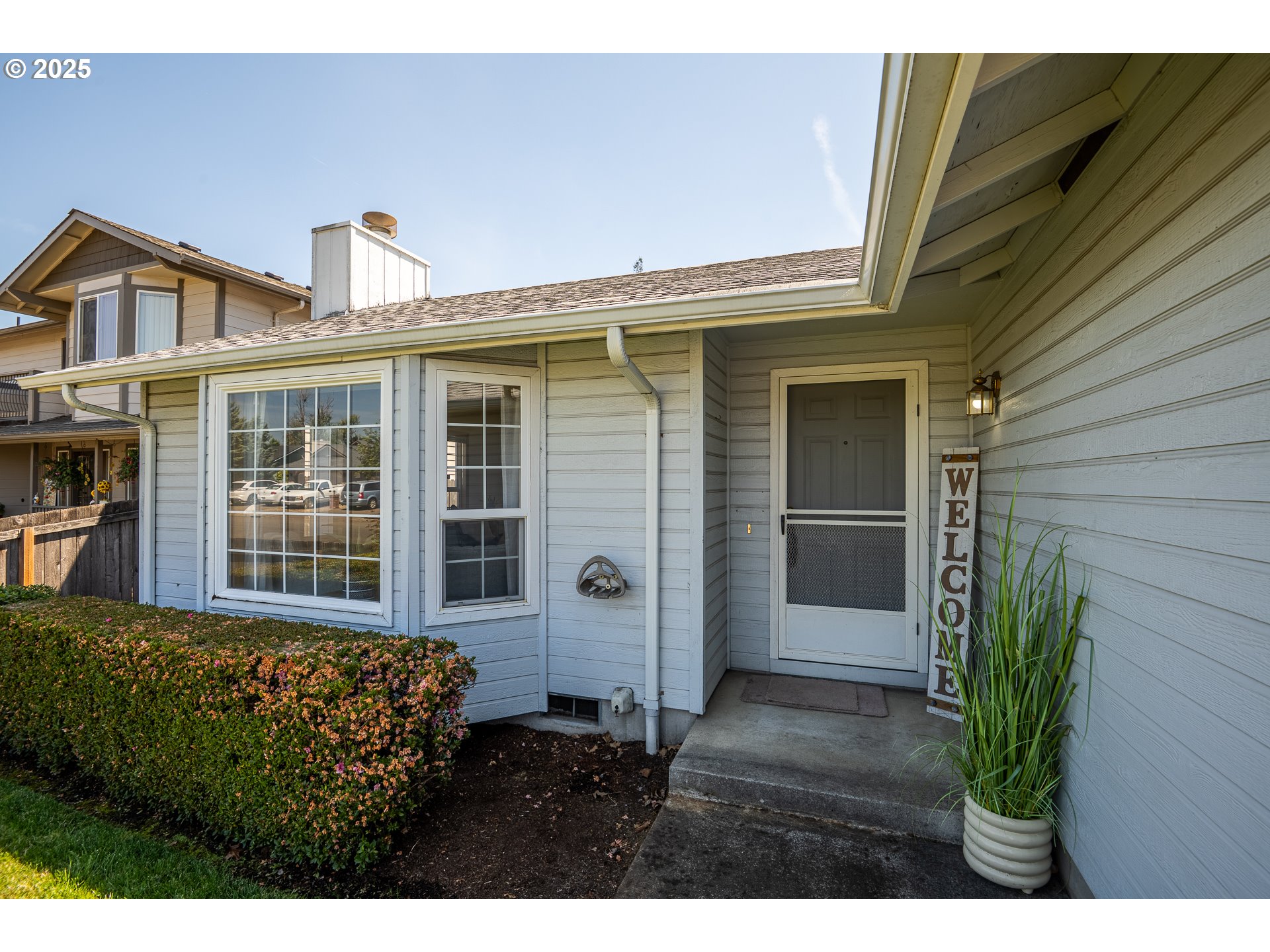 5669 D Street Springfield, OR 97478 - Photo 28 of 30 a front view of a house with a garden