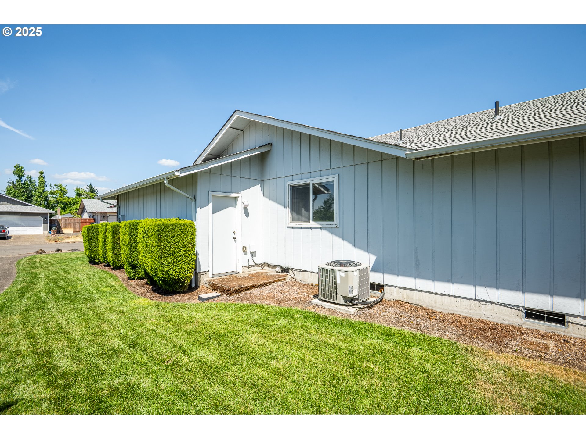 5669 D Street Springfield, OR 97478 - Photo 29 of 30 a front view of a house with a yard