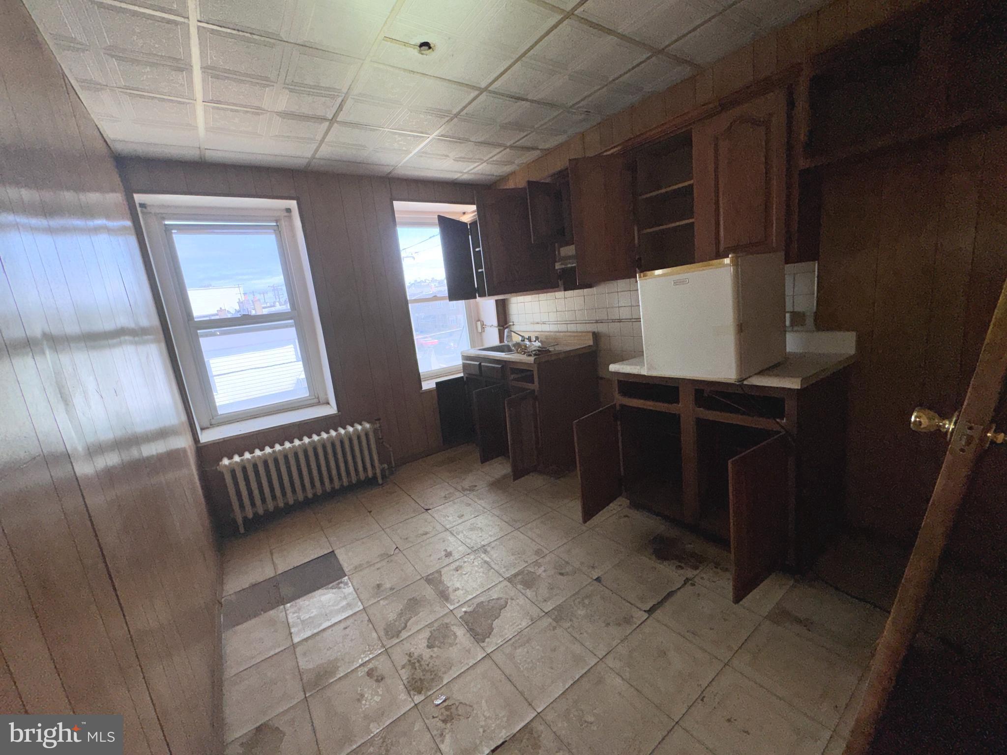 6701 Lansdowne Avenue Philadelphia, PA 19151 - Photo 16 of 18 3rd floor kitchen