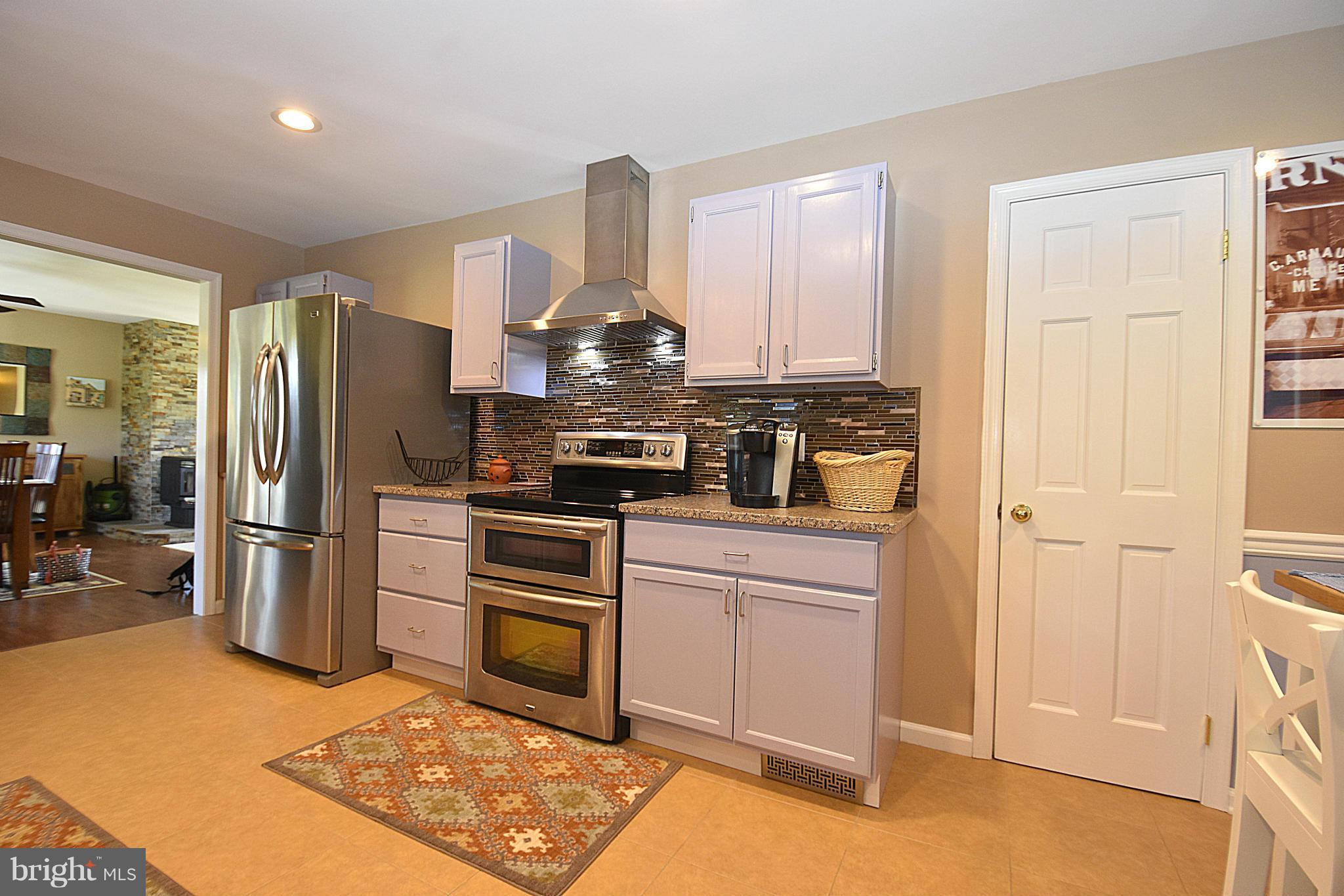 6677 Reeses Pride Road Sherwood, MD 21665 - Photo 11 of 30 Kitchen with Stainless Appliances