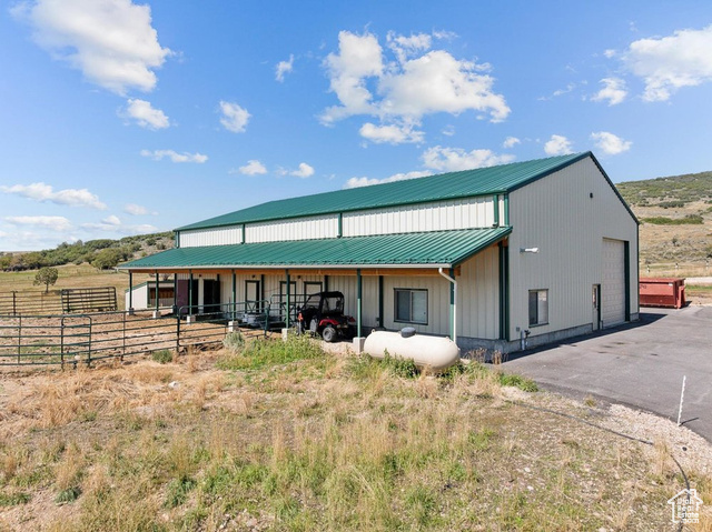 6117 North Rocky Ridge Road Peoa, UT 84061 - Photo 71 of 83 Back of house with an outdoor structure