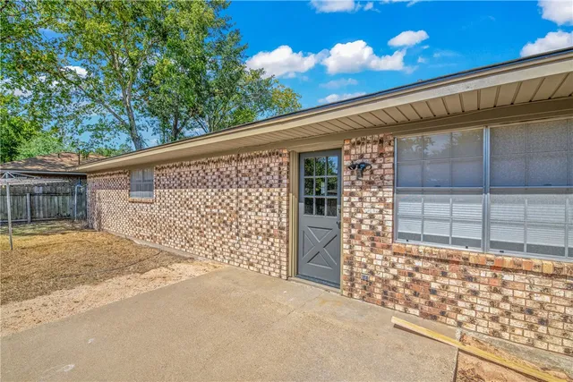 a front view of a house with a garage