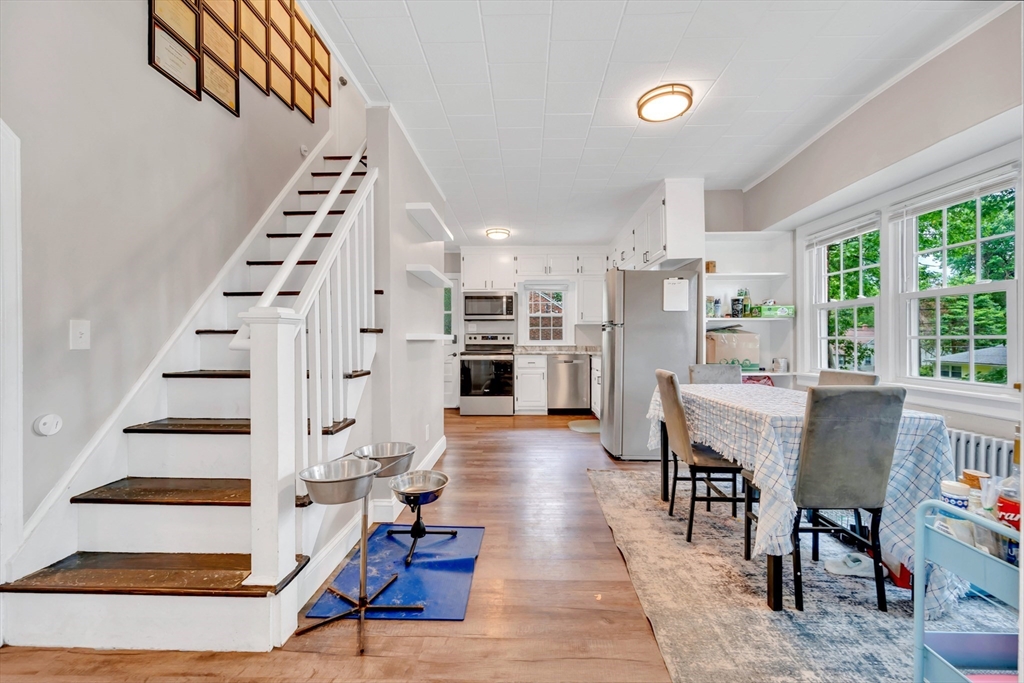 295 Harkness Avenue Springfield, MA 01118 - Photo 13 of 39 a view of entryway and hall with wooden floor