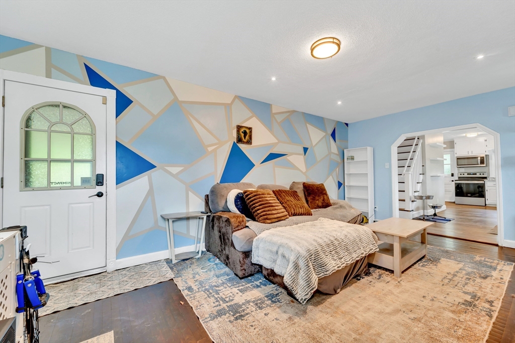 295 Harkness Avenue Springfield, MA 01118 - Photo 14 of 39 a bedroom with a bed and a cabinets