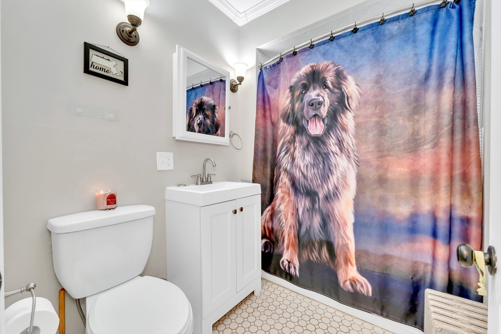 295 Harkness Avenue Springfield, MA 01118 - Photo 24 of 39 a bathroom with a toilet and a sink