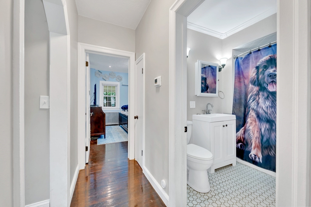 295 Harkness Avenue Springfield, MA 01118 - Photo 25 of 39 a bathroom with a toilet and a view of bathroom