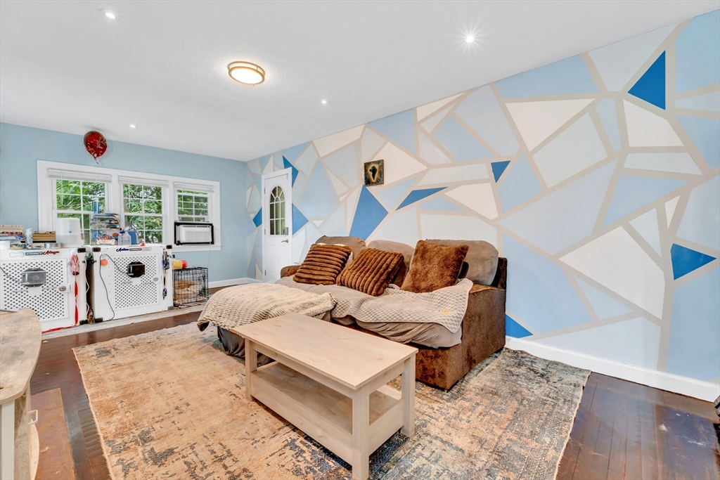 295 Harkness Avenue Springfield, MA 01118 - Photo 3 of 39 a bed room with a bed and a window