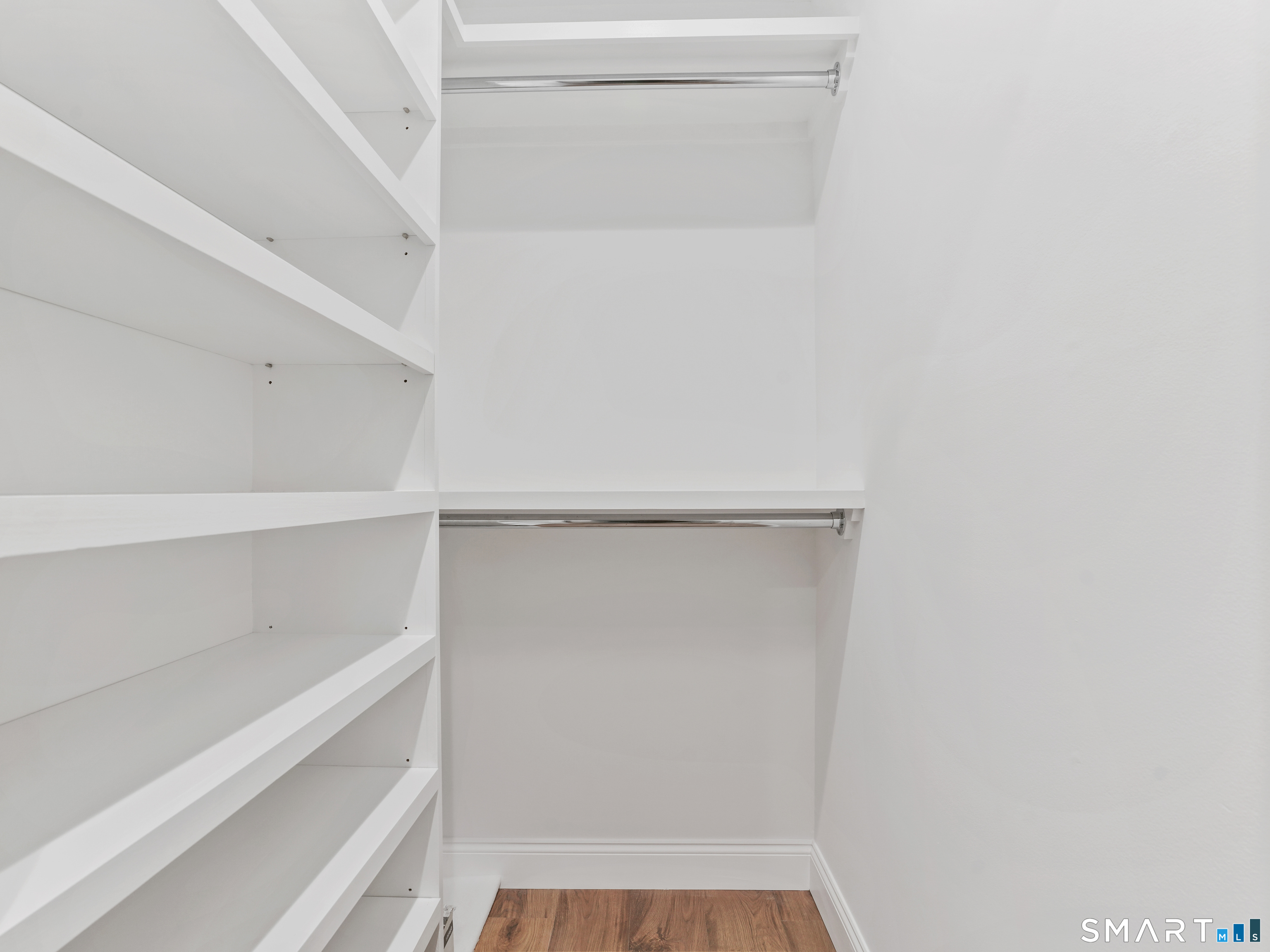 92 Wilton Crest Road Wilton, CT 06897 - Photo 11 of 19 a view of an empty walk in closet