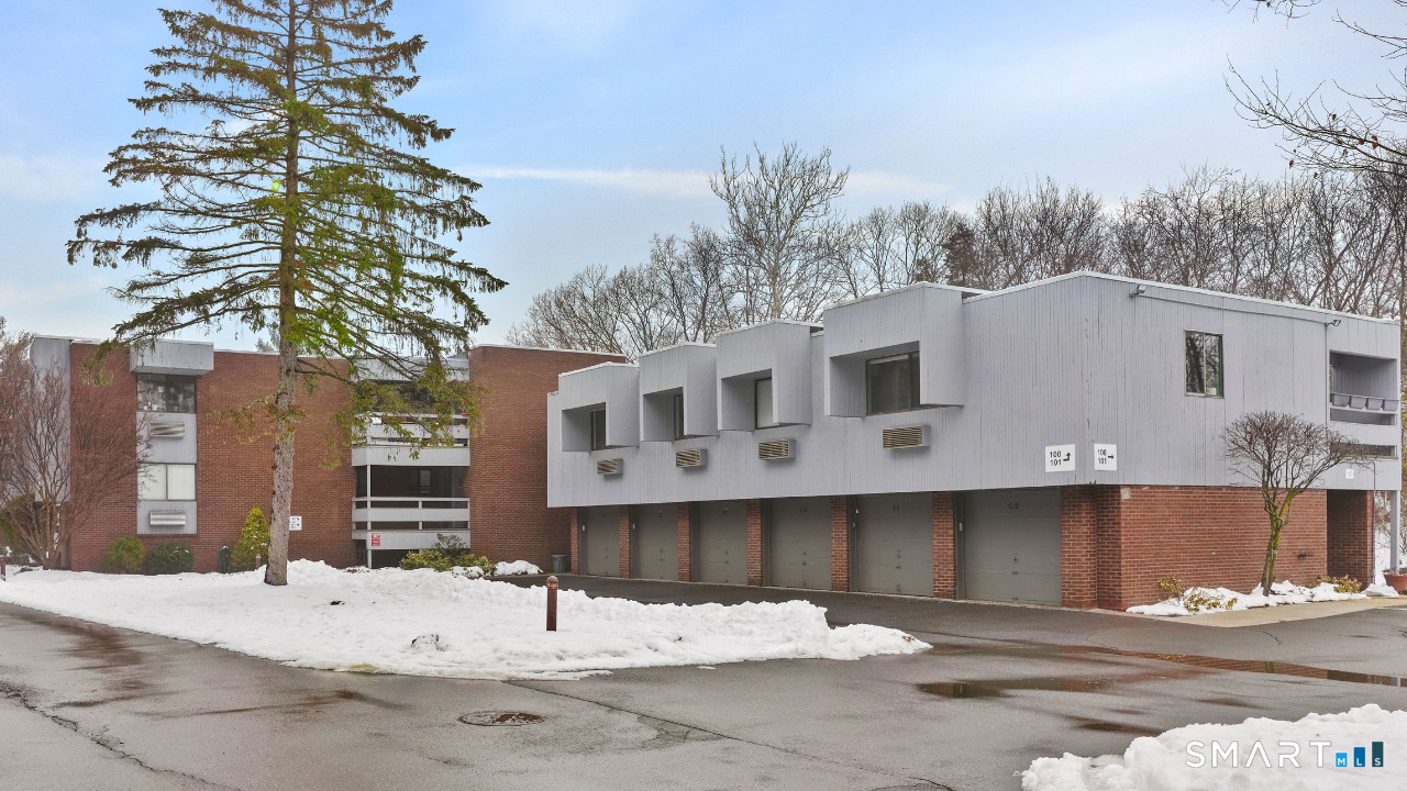 92 Wilton Crest Road Wilton, CT 06897 - Photo 12 of 19 a white building that has a tree in front of it