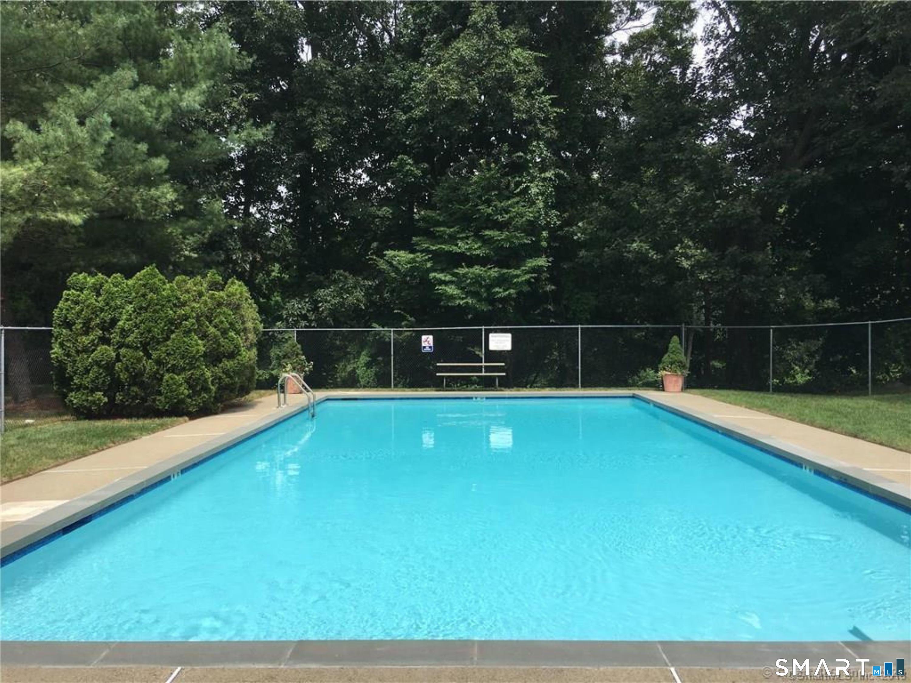 92 Wilton Crest Road Wilton, CT 06897 - Photo 18 of 19 a view of a tennis court