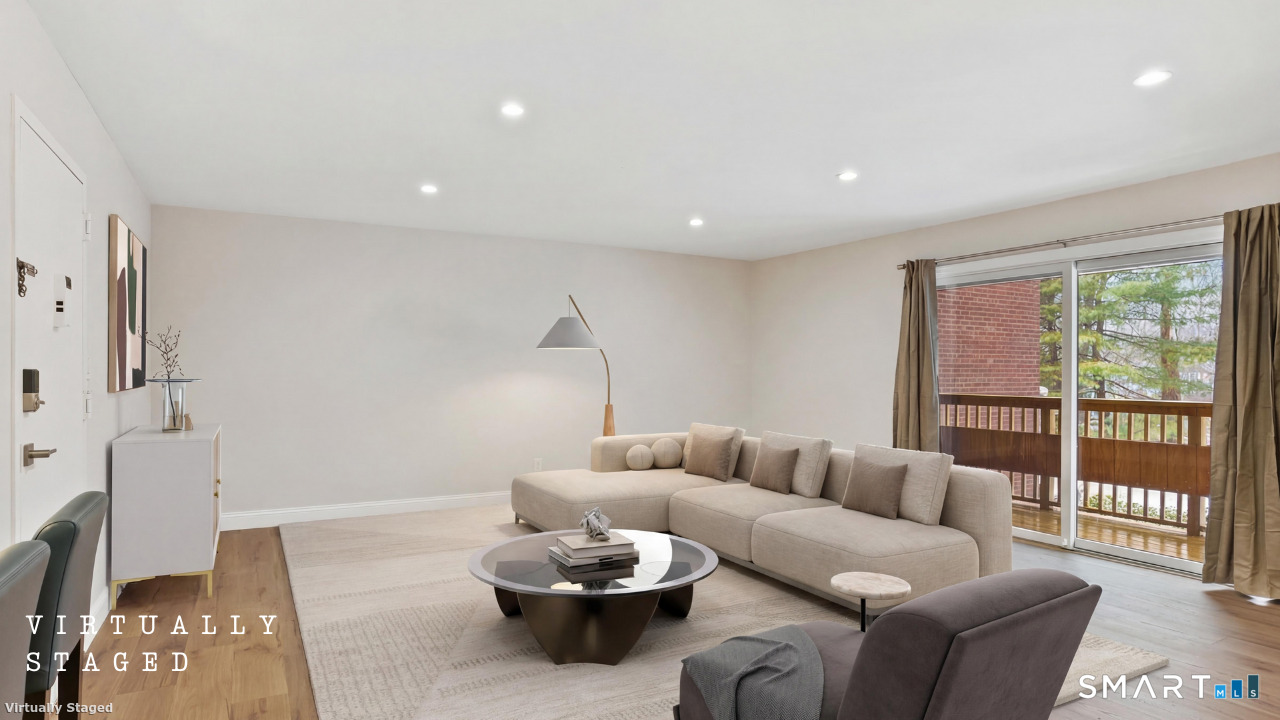 92 Wilton Crest Road Wilton, CT 06897 - Photo 2 of 19 a living room with furniture and a window