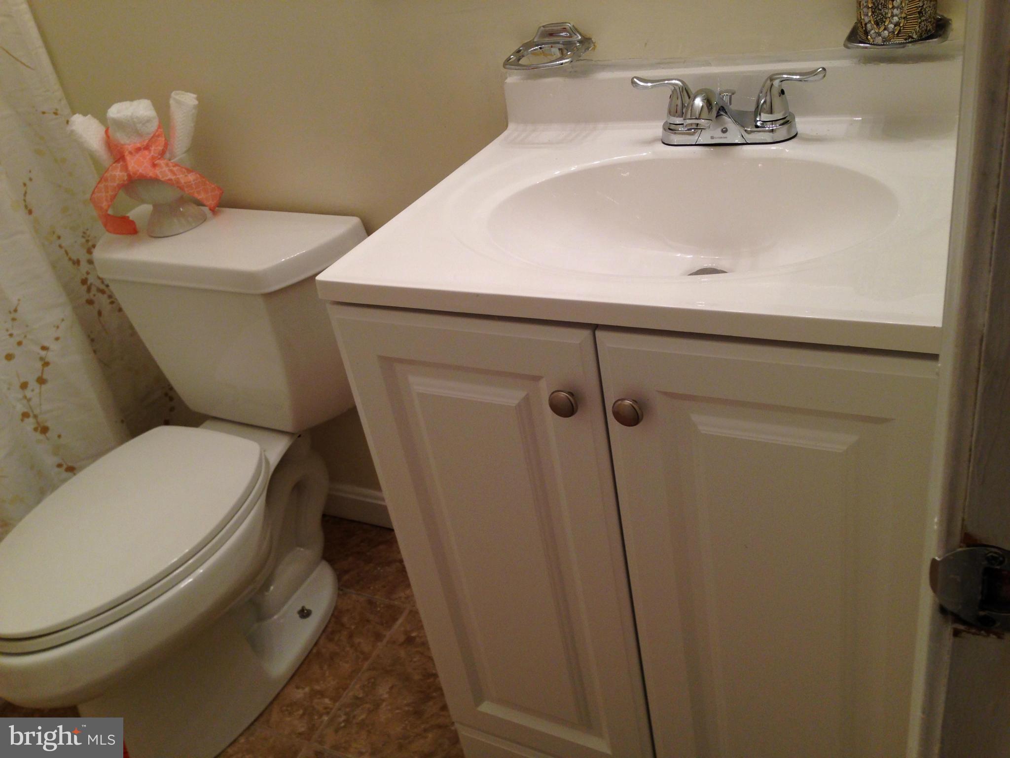 7704 Foxhall Road Clinton, MD 20735 - Photo 22 of 30 Half Bath on the Lower Level