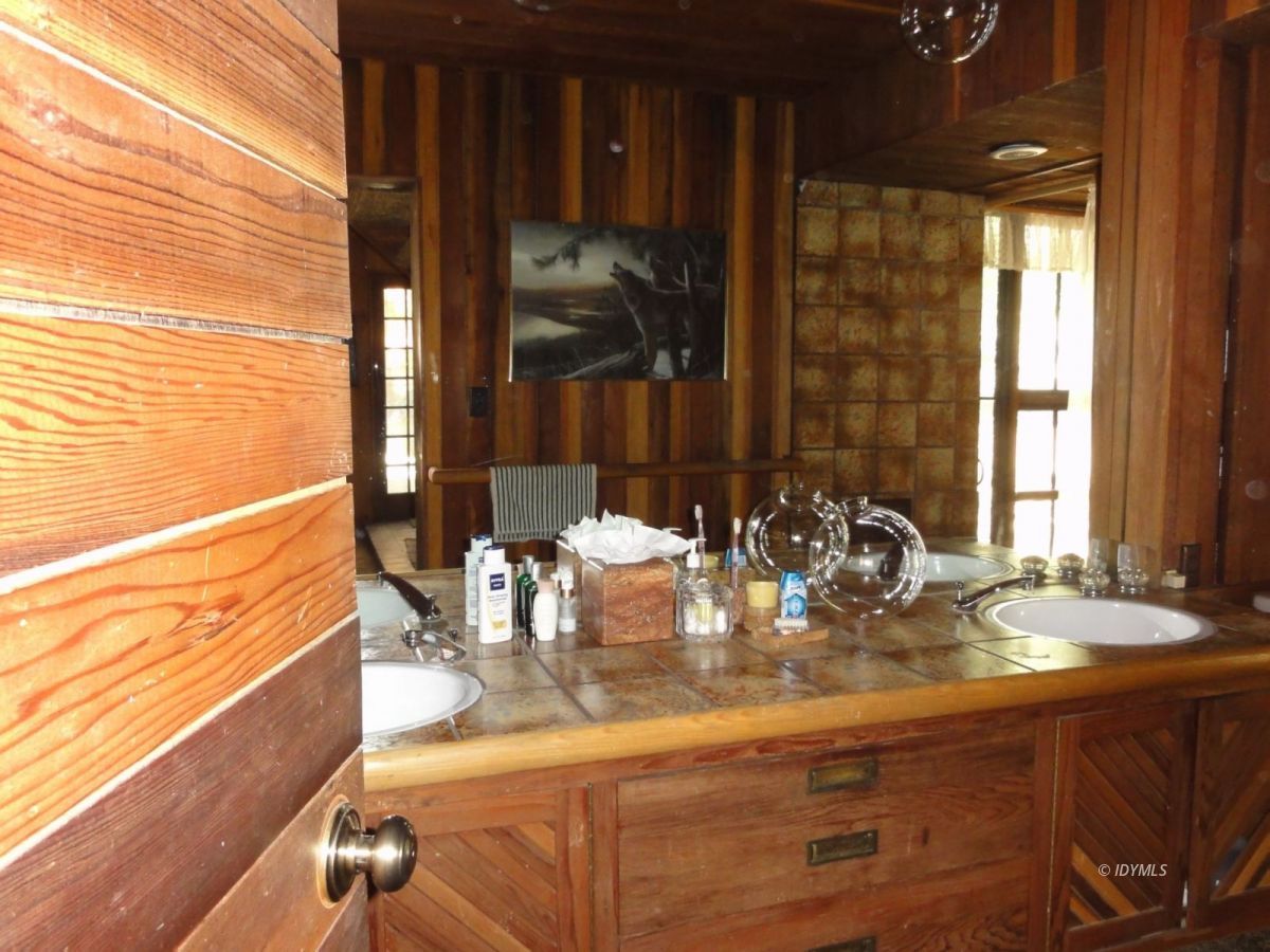 24945 Fern Valley Road Idyllwild, CA 92549 - Photo 16 of 28 a view of a dining room with furniture and window