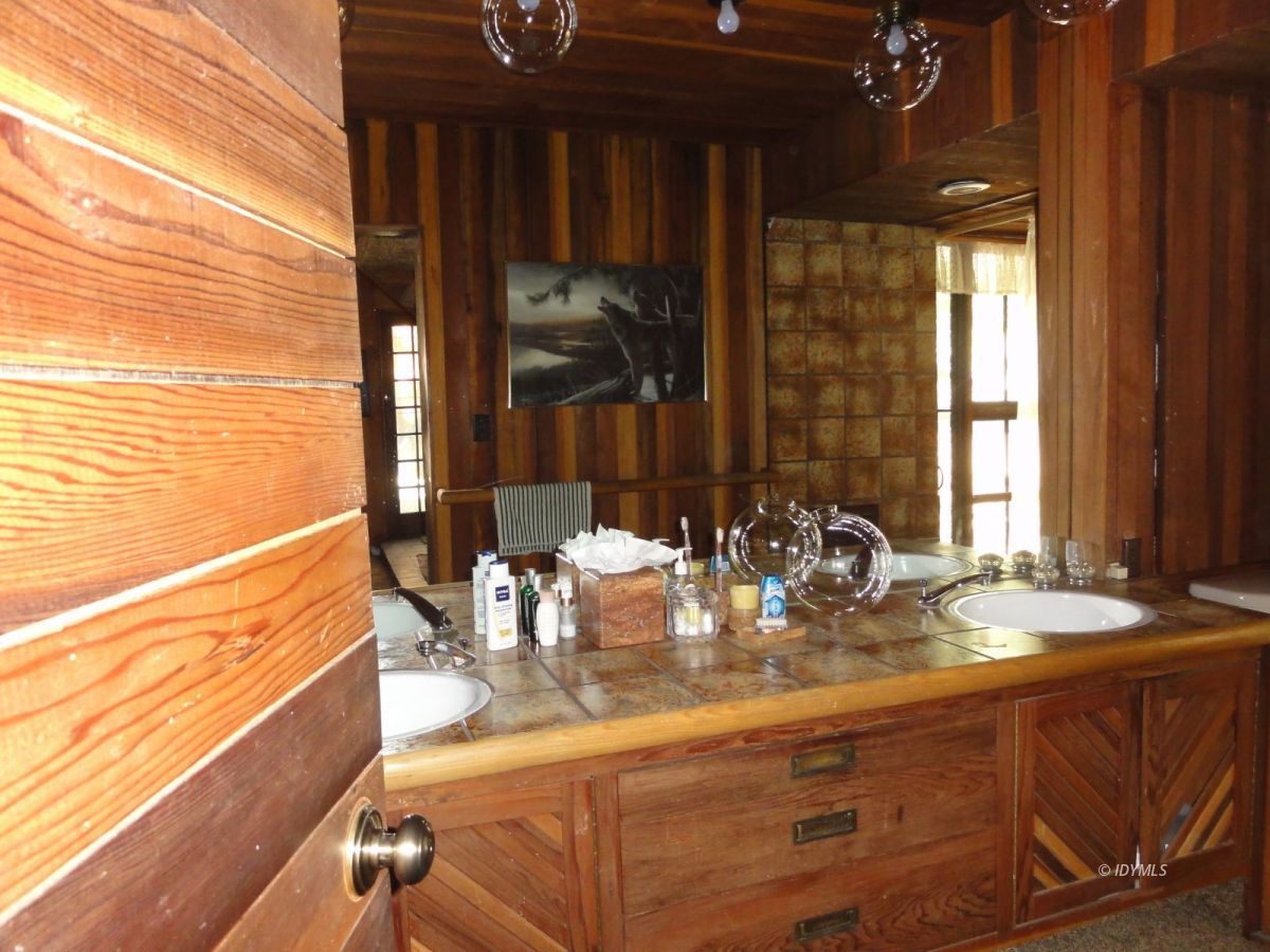 24945 Fern Valley Road Idyllwild, CA 92549 - Photo 17 of 28 a view of a dining room with furniture and window