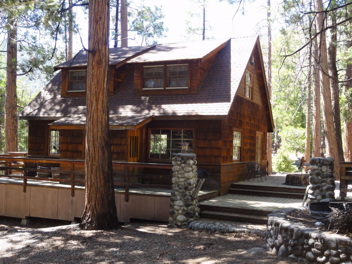 24945 Fern Valley Road Idyllwild, CA 92549 - Photo 2 of 28 a front view of a house with a yard
