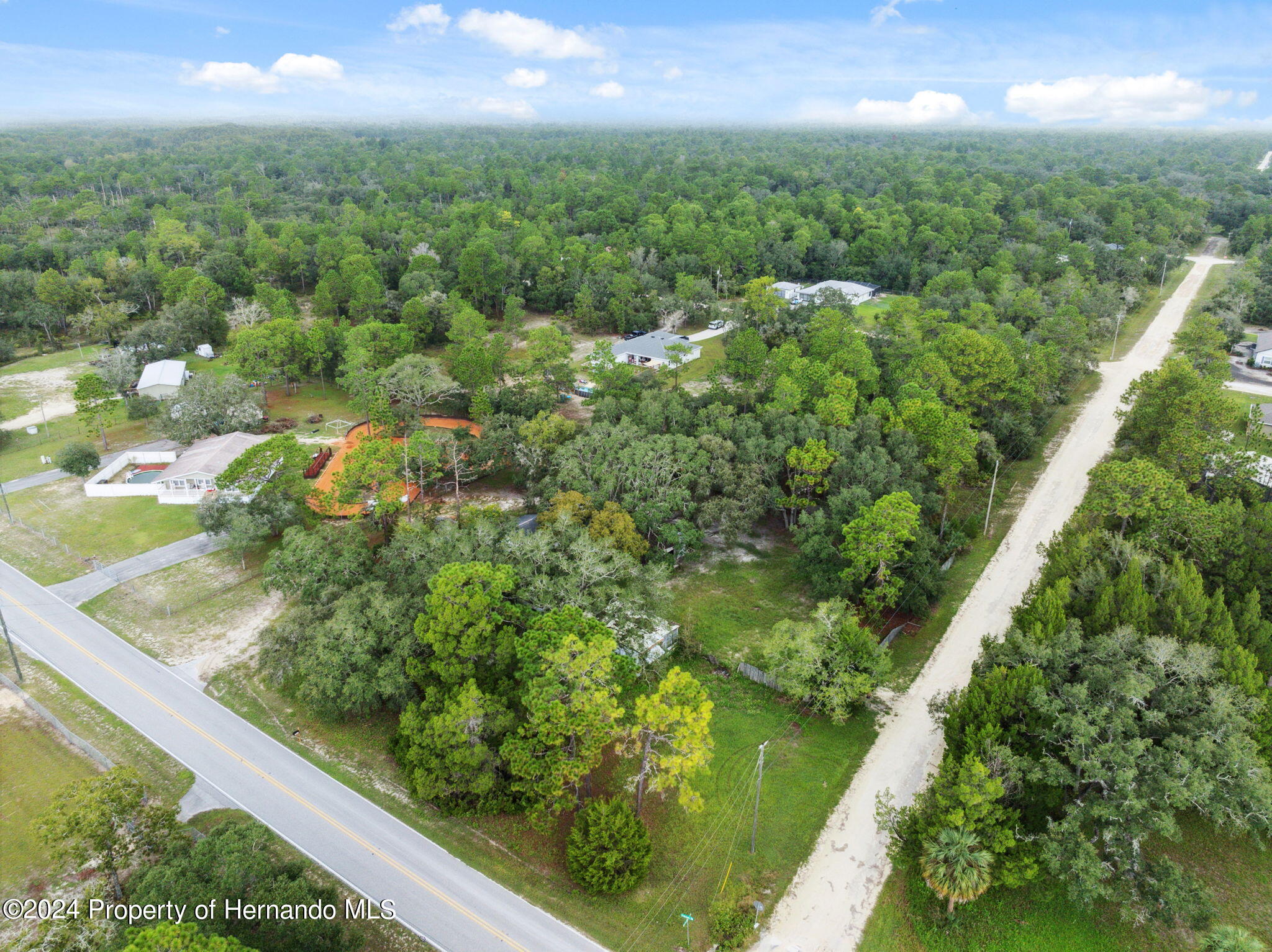 11017 Knuckey Road Weeki Wachee, FL 34614 - Photo 31 of 39 a view of a garden from a balcony