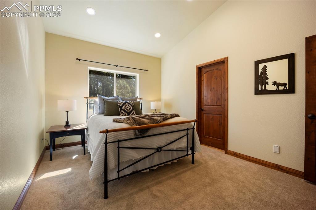 18525 Glenthorne Lane Monument, CO 80132 - Photo 17 of 49 a living room with furniture and a window
