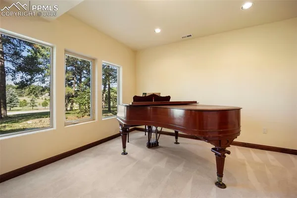a room with furniture and a window