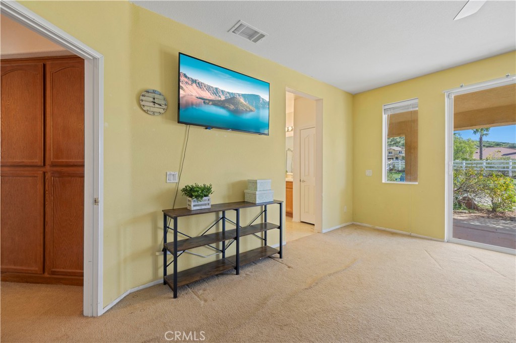 34250 McEnnery Canyon Road Acton, CA 93510 - Photo 22 of 63 a view of a livingroom with furniture and windows